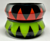 WT16 translucent green and orange with black claw resin bangles